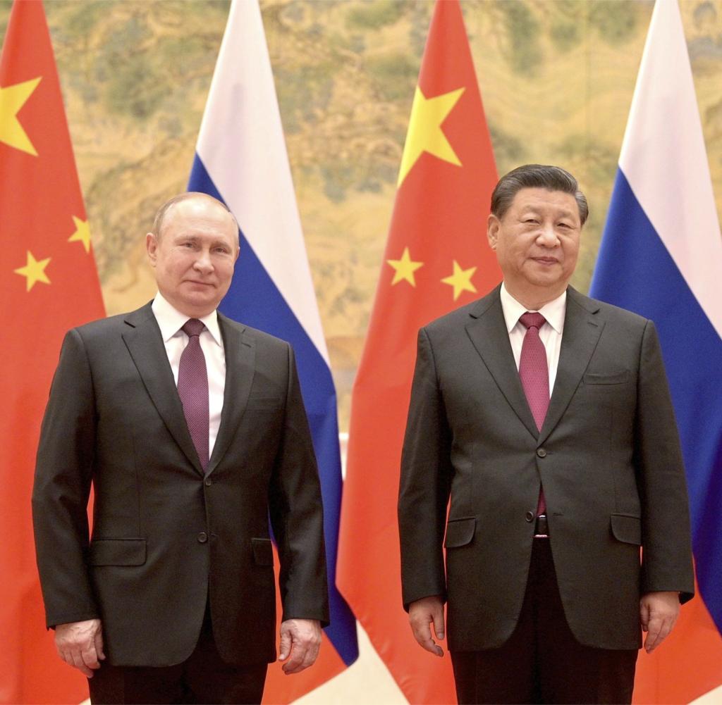 Persahabatan antara Vladimir Putin (kiri) dan Xi Jinping menimbulkan ancaman keamanan bagi Barat